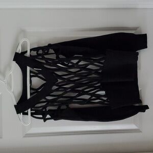 New without tag. AKIRA Cut Out Black Long Sleeve Sweater Size S/M